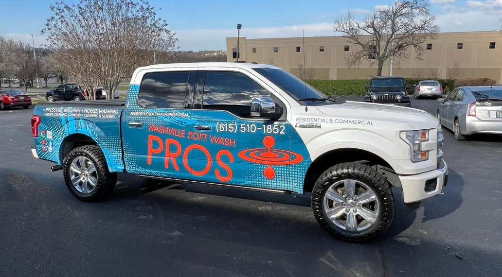Image of a wrapped Ford F-150 from a pressure washing business.