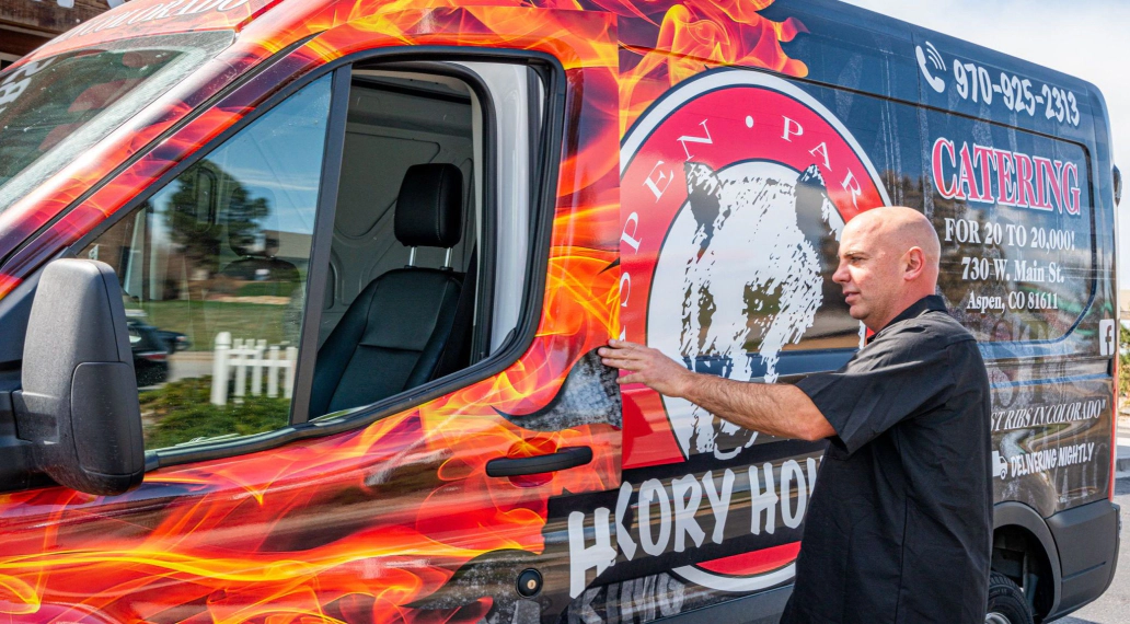 Image of a wrapped Ford Transit from Hickory House Barbeque