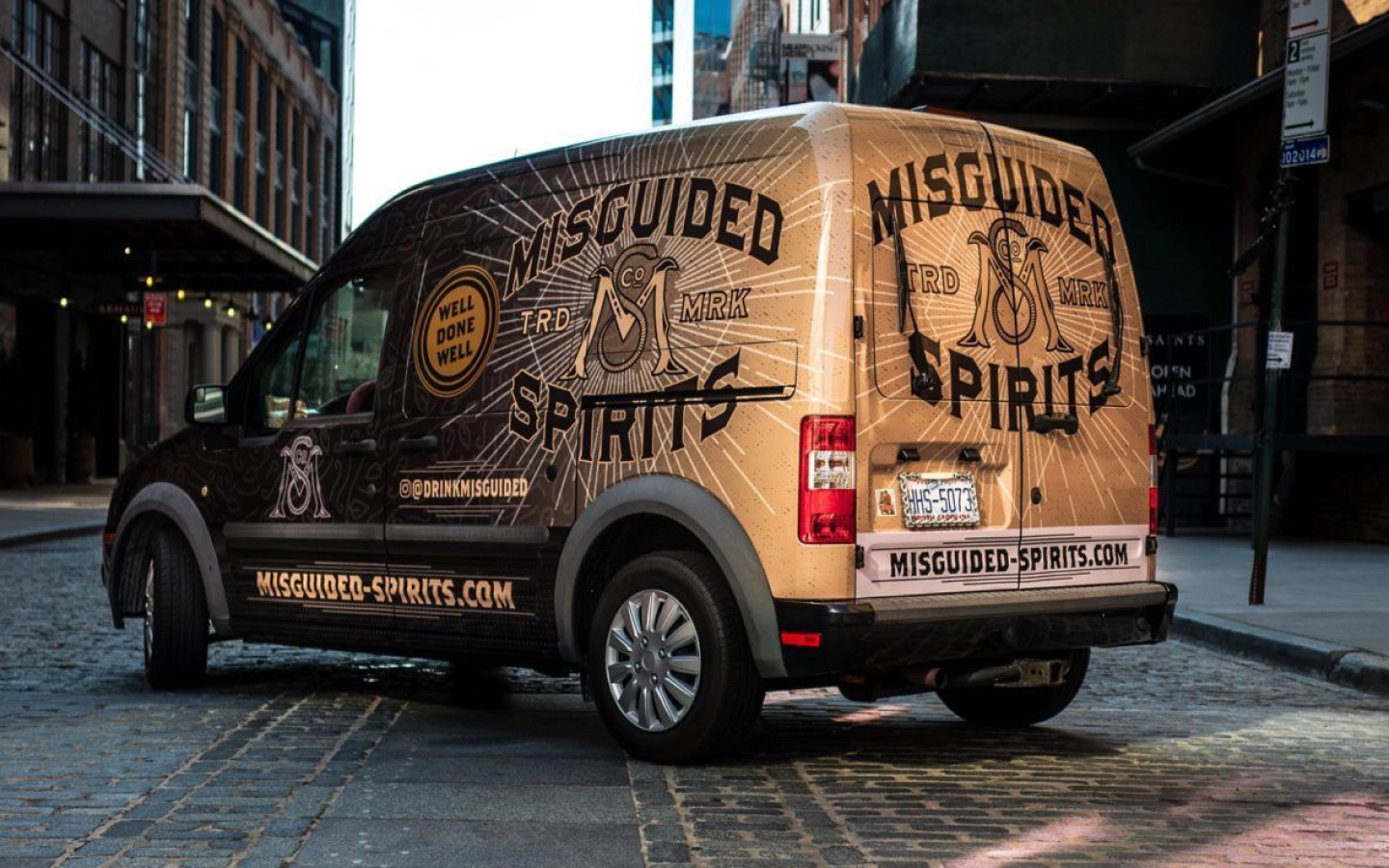 Image of a wrapped Ford Transit from Misguided Spirits