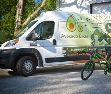Image of a wrapped van from Avacado Bikes
