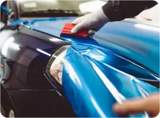 image of a pro installing a vehicle wrap