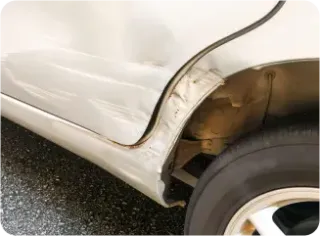 Image of a dented up truck